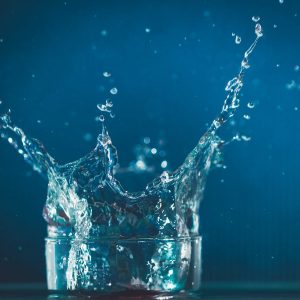 water splash in clear drinking glass