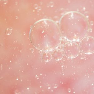 water droplets on red surface